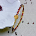 Inner Aura Awakening: Hand-Woven Gold Thread & Garnet Root Chakra Bracelet
